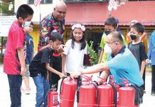 RUN OUT IF YOUR HOUSE IS ON FIRE, FIRE CHIEF TELLS CHILDREN