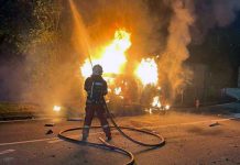 Firemen Douse Fire that Engulfed Vehicle After Road Accident