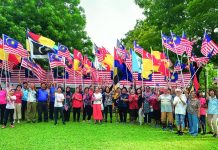 FLAGS FLY HIGH ON MALAYSIA DAY AS RESIDENTS CELEBRATE THE SPECIAL OCCASION