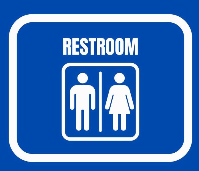 Blue White Illustration Restroom Sign A4 Document - 1